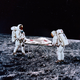 Astronauts prepare the Creator's body for its return to Earth.